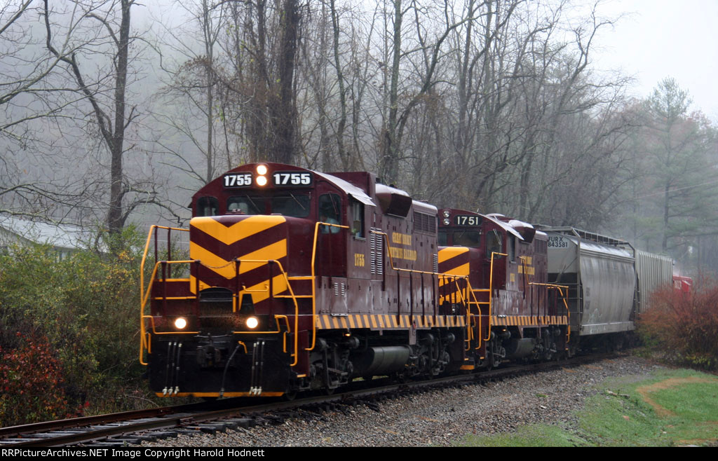 GSMR 1755 & 1751 lead a short train westbound on a rainy morning